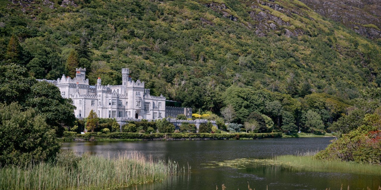 Scenic view of a castle and lake in connemara, Galway